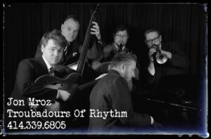 Troubadours of Rhythm logo